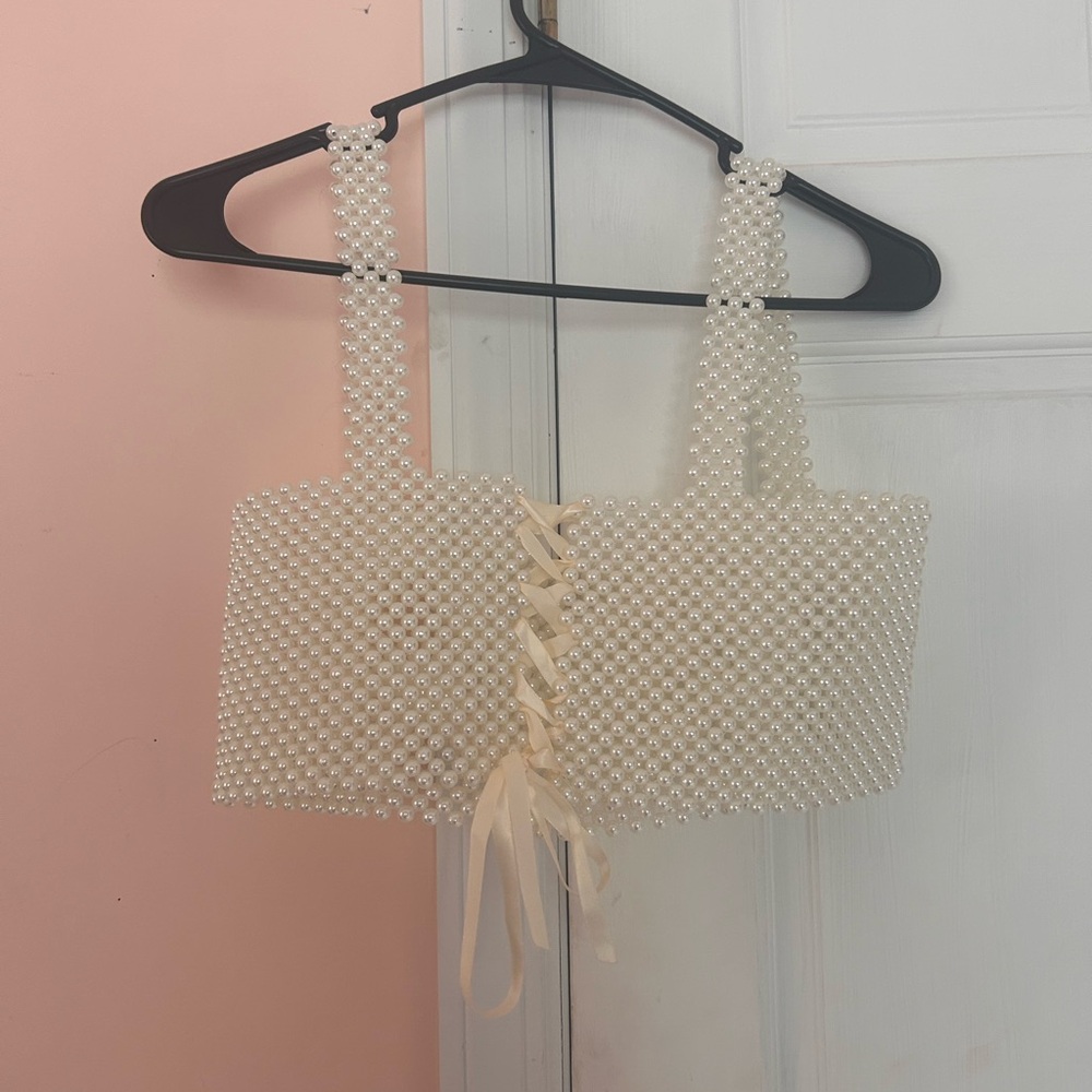 White Pearl top with a corset back perfect for casual, party, festival,etc
